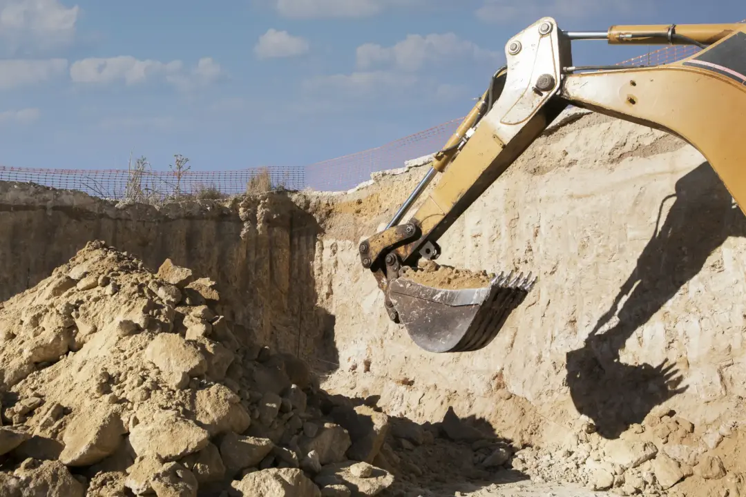 Reaching Waste Over Walls